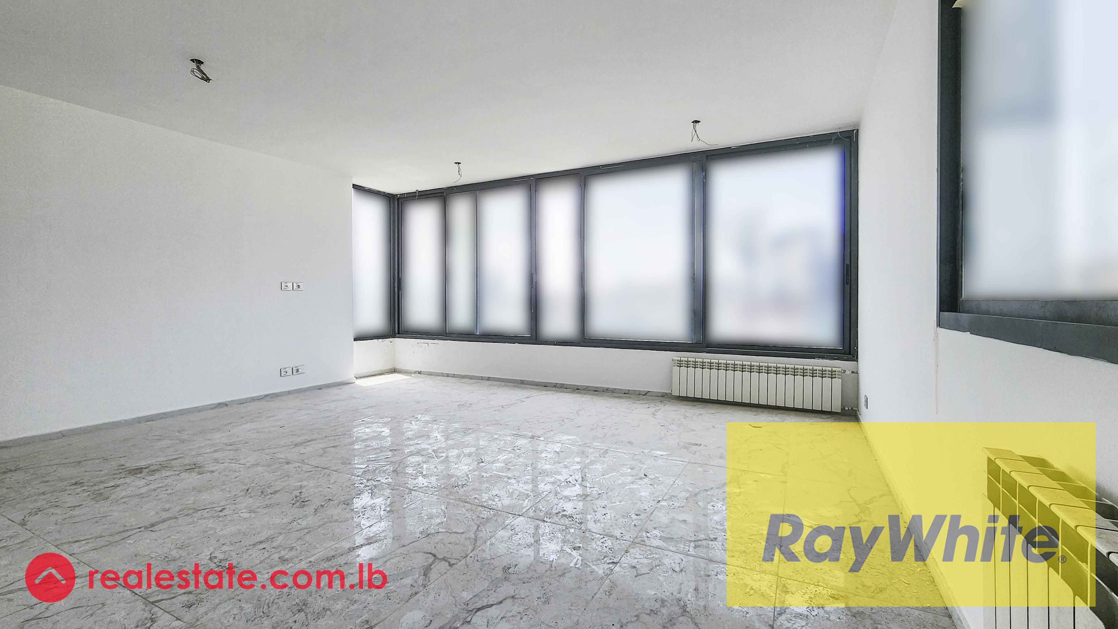 Three Bedrooms Apartment With an Open View For Sale in Achrafieh