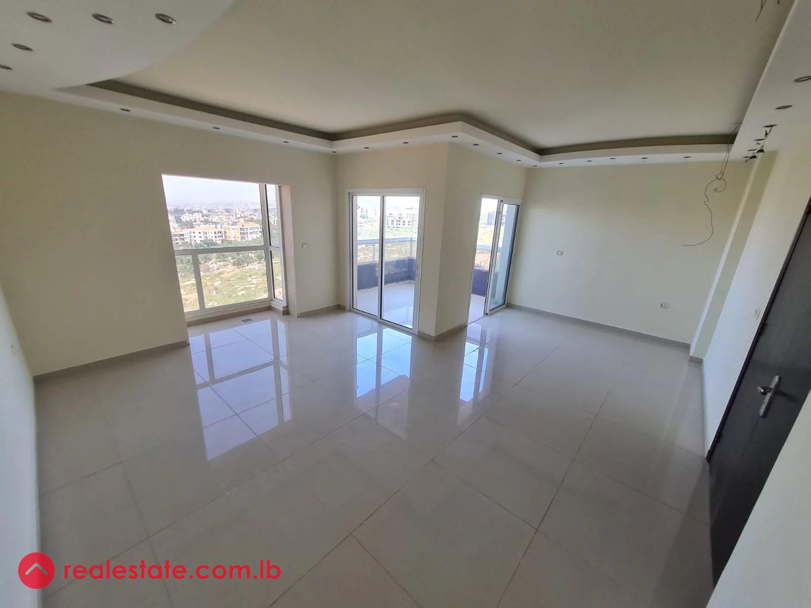 Modern Apartment with Breathtaking Views in Btouratij, Al Koura