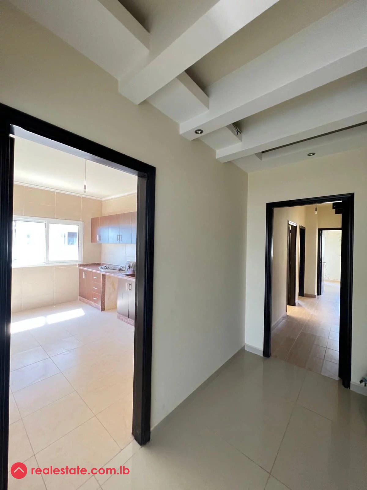 Modern Apartment with Breathtaking Views in Btouratij, Al Koura