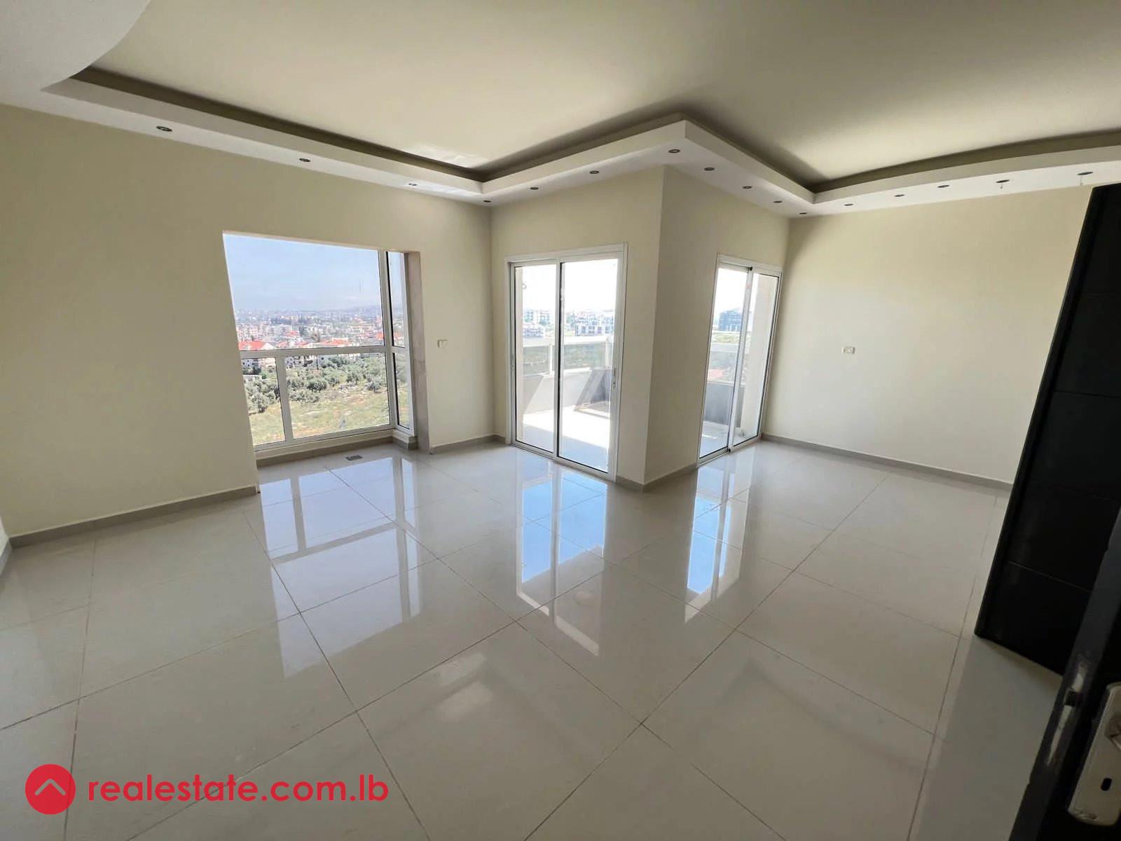Modern Apartment with Breathtaking Views in Btouratij, Al Koura