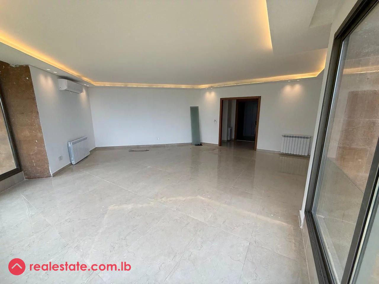 Elegant Apartment with Sea and Greenery Views in Beit al Kiko
