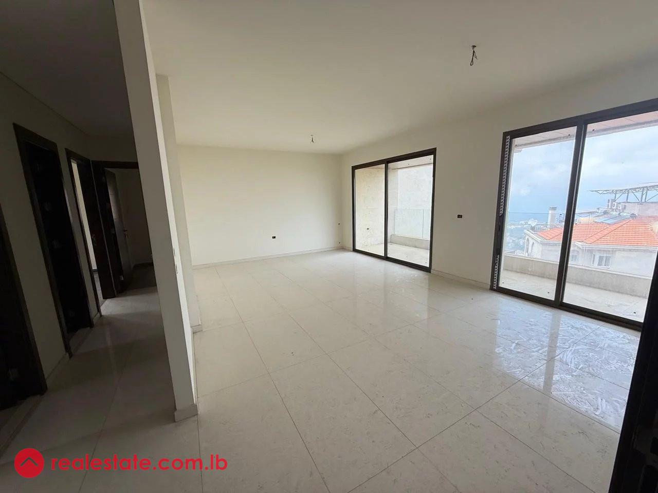 Bright 3-Bedroom Apartment with Maids Room and 3 Balconies in Ain Aar