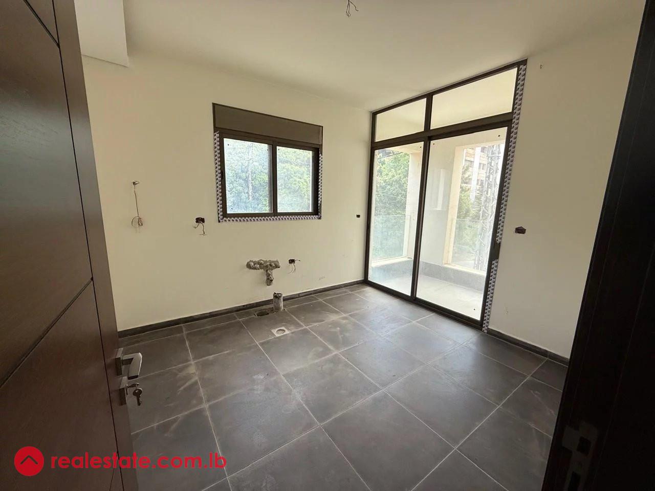 Bright 3-Bedroom Apartment with Maids Room and 3 Balconies in Ain Aar