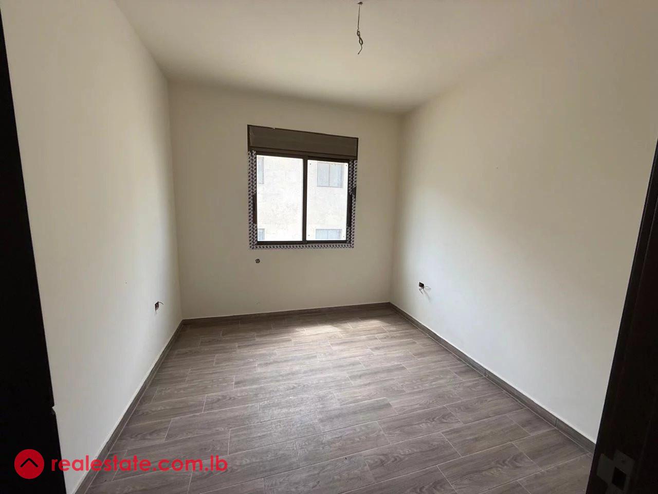 Bright 3-Bedroom Apartment with Maids Room and 3 Balconies in Ain Aar