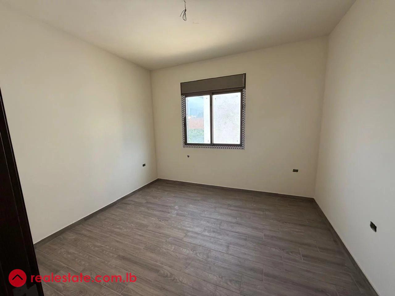 Elegant 3-Bedroom Apartment in Ain Aar