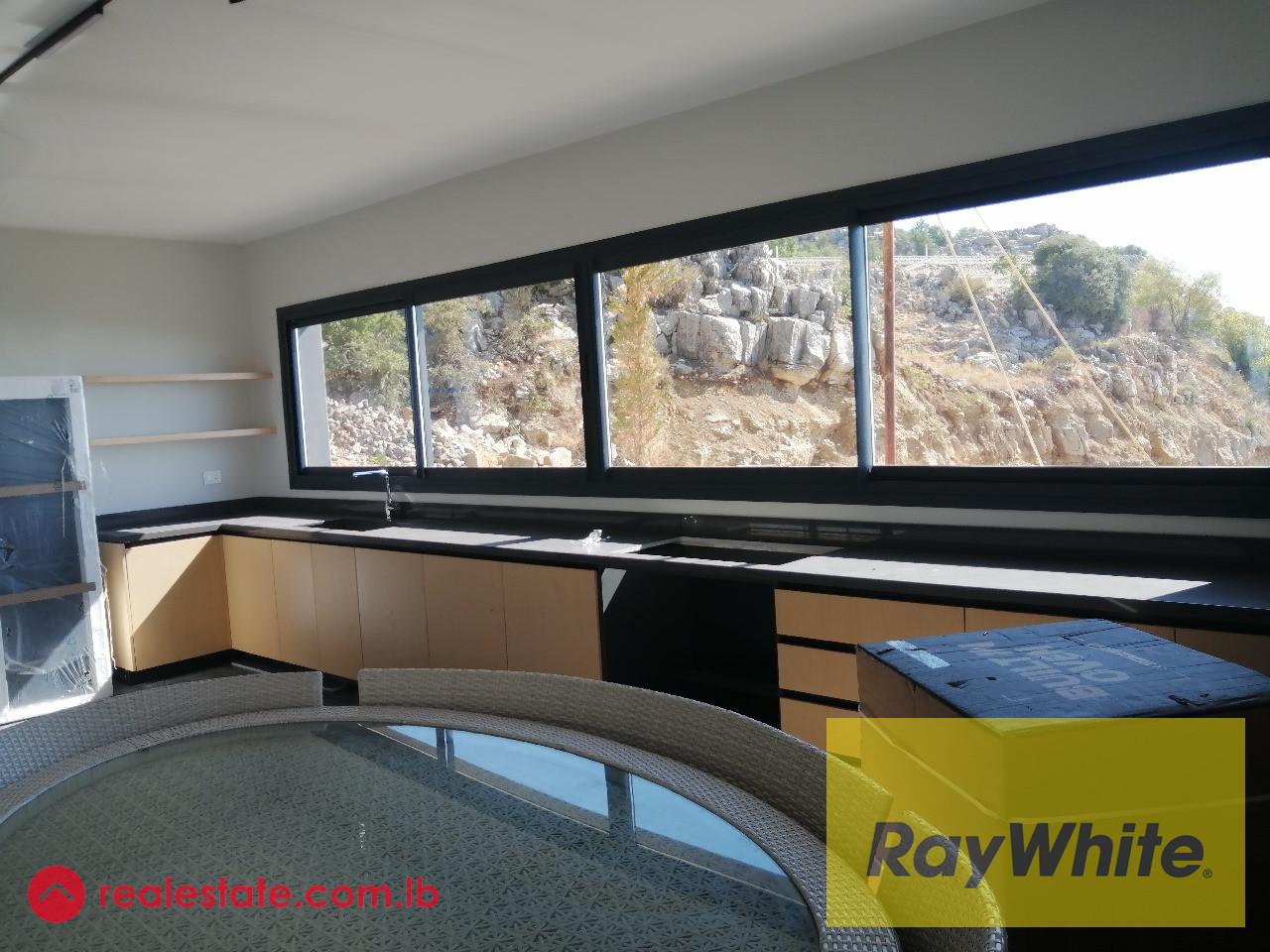 Apartment for Sale In Faqra With Terrace