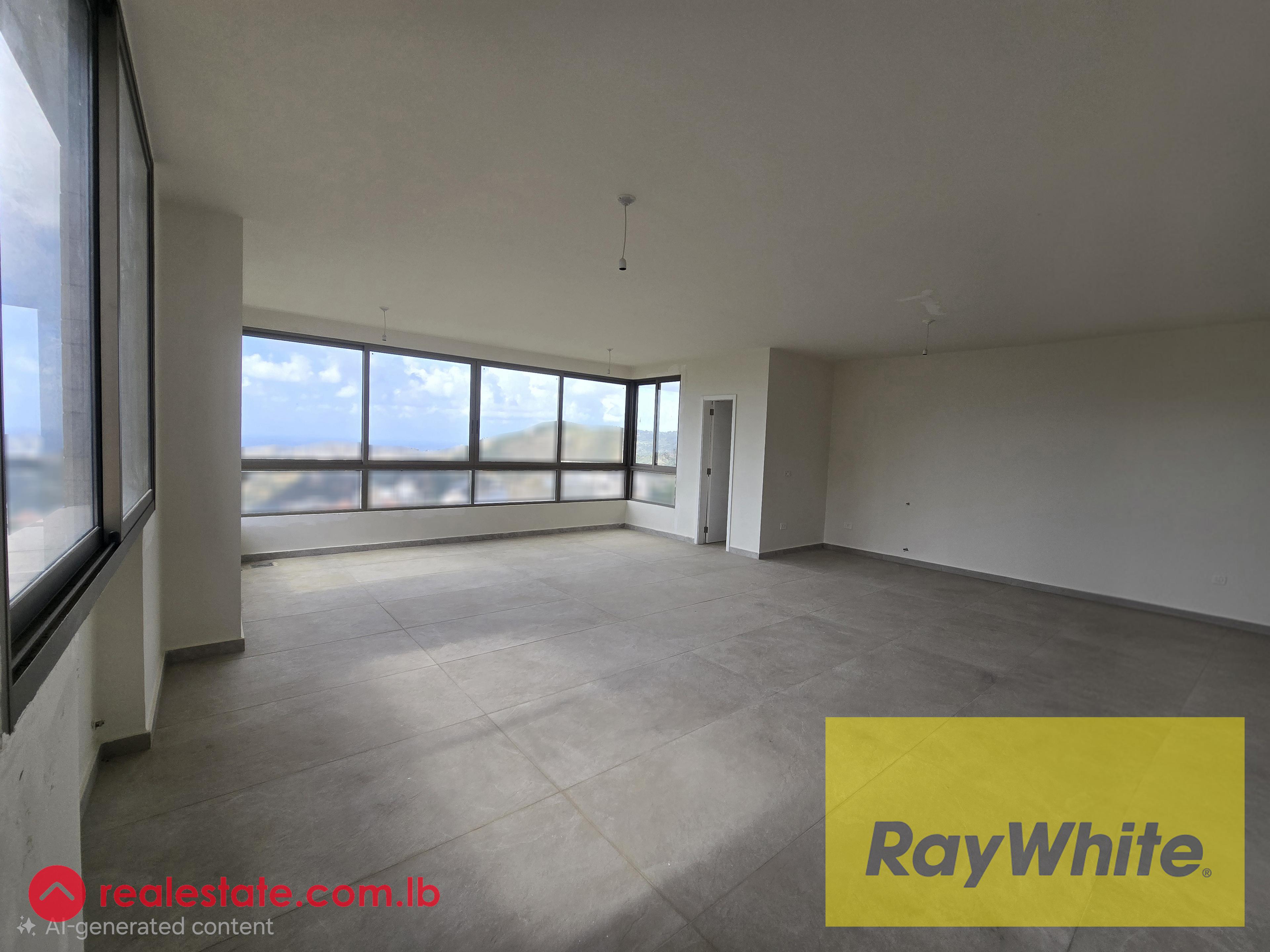 Apartment with Private Roof for Sale in Zikrit | Open View & Privacy