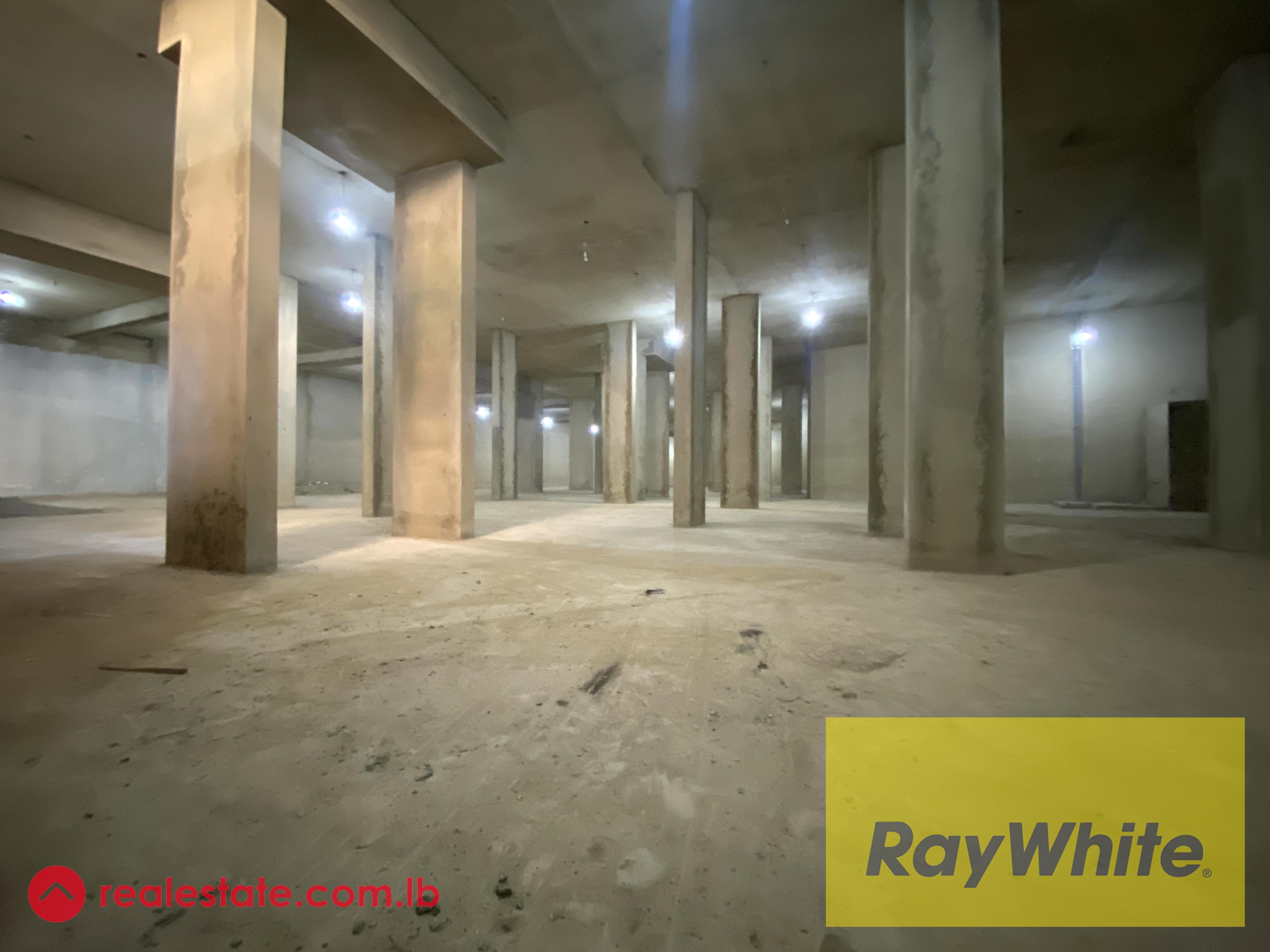 Warehouse for Sale in Dekwaneh – 1,250 sqm with High Clearance and Truck Access