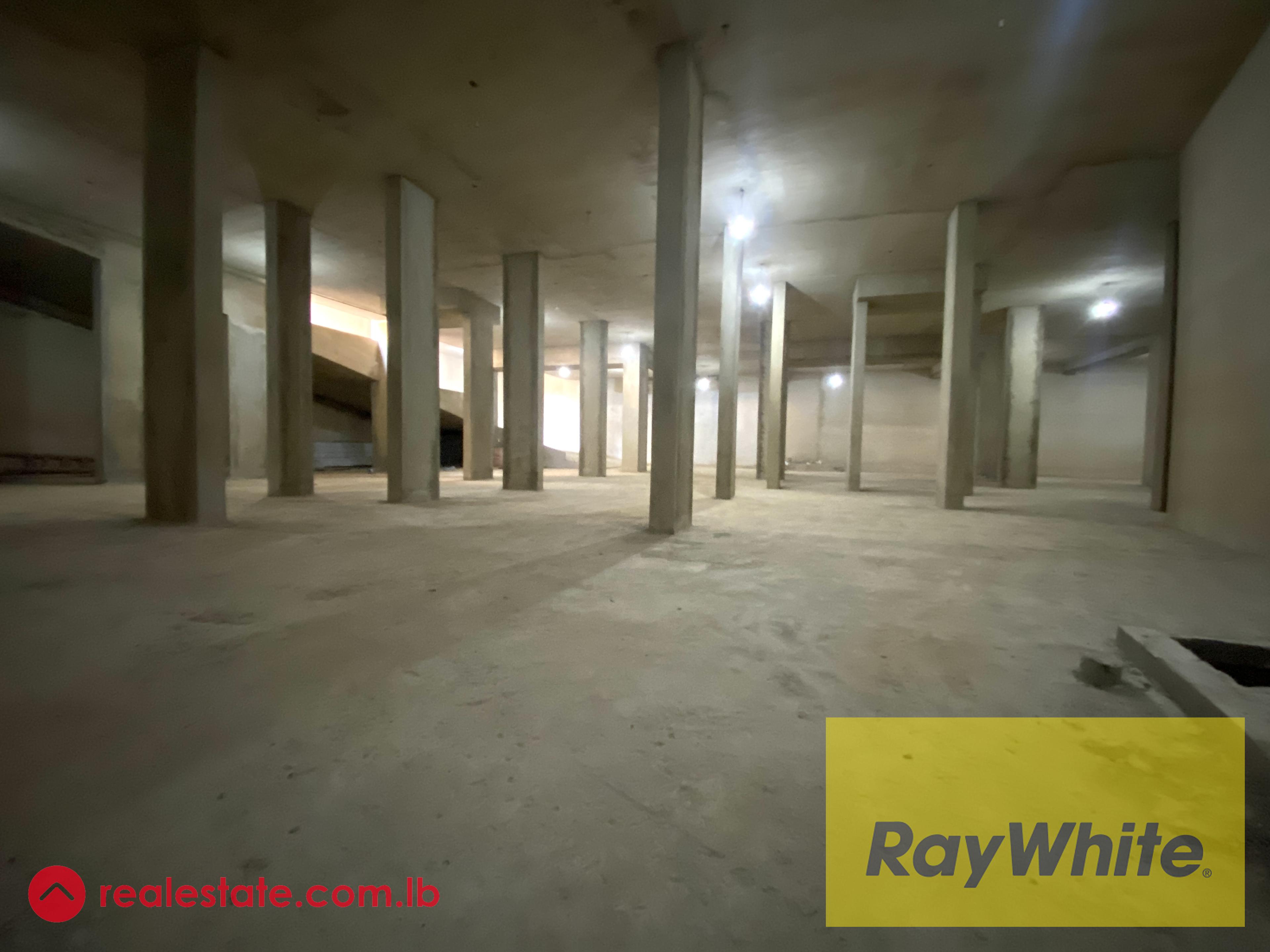 Warehouse for Sale in Dekwaneh – 1,250 sqm with High Clearance and Truck Access