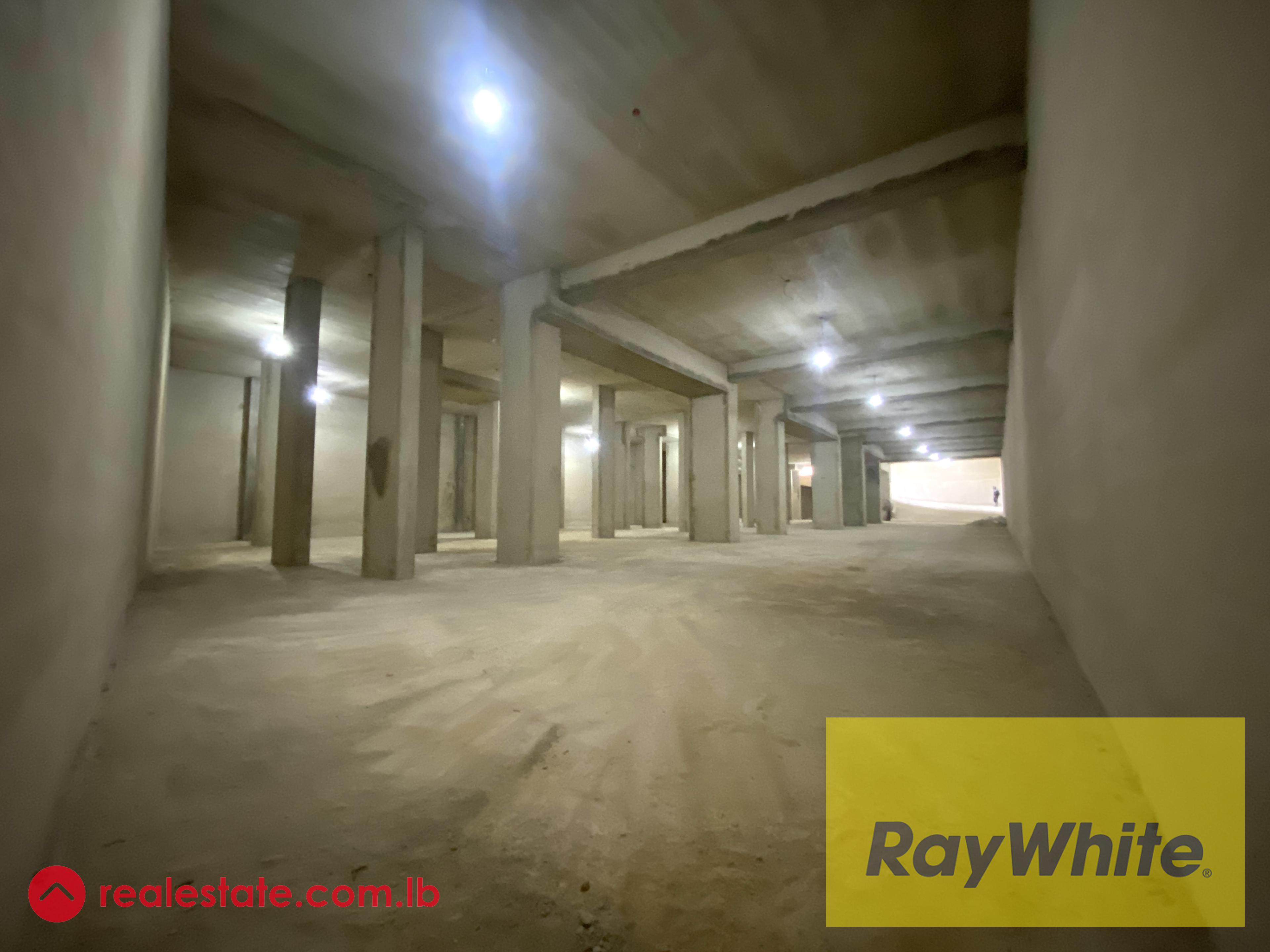 Warehouse for Sale in Dekwaneh – 1,250 sqm with High Clearance and Truck Access